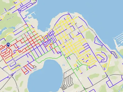 A colour‑coded street map of Midland with roads highlighted in gree, yellow, red, purple, or gray.